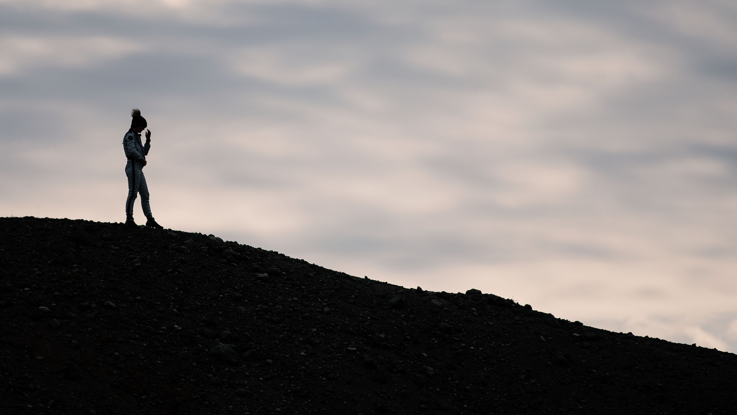 Jessica Hawkins standing on a gravel mound