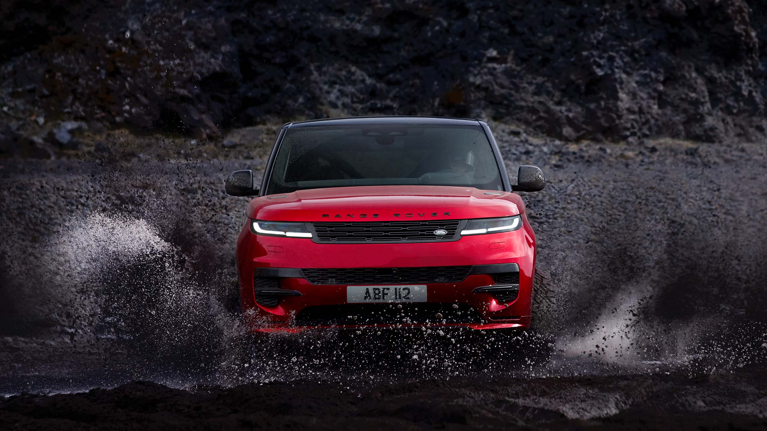 Range Rover Sport driving through mud in Iceland 