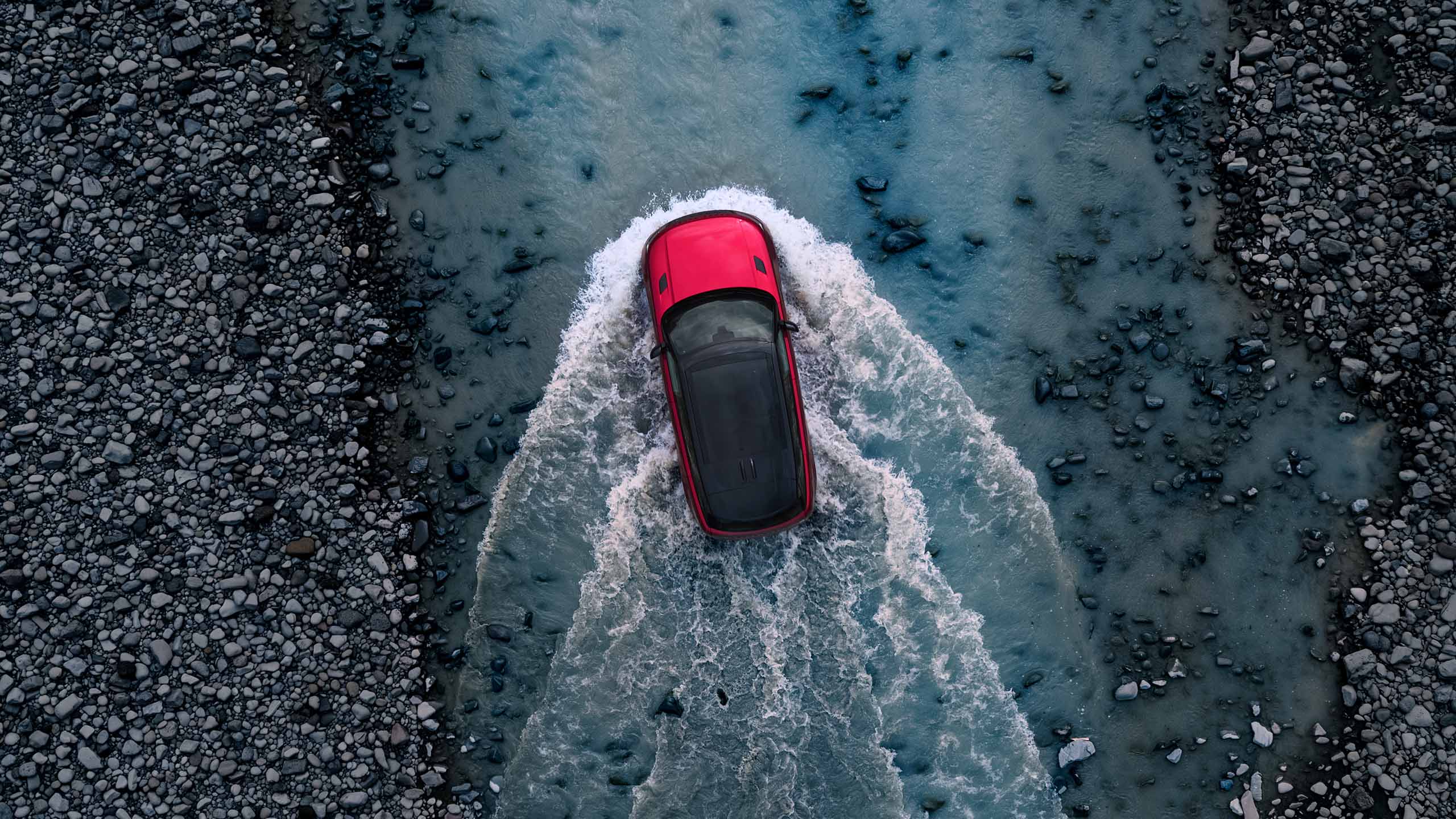 Range Rover Sport wading through a river